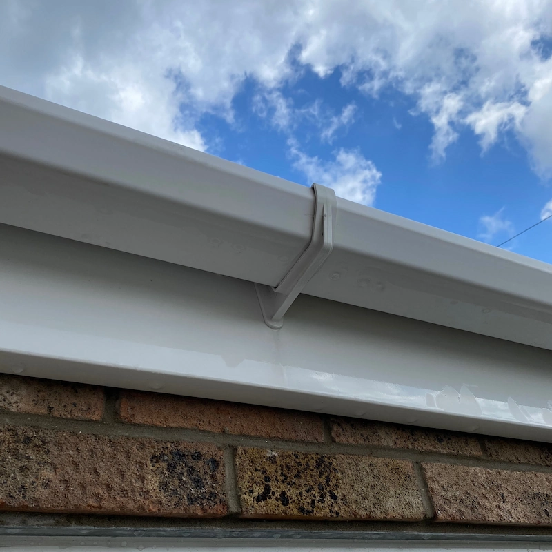 Bright white, clean fascias and gutters after cleaning